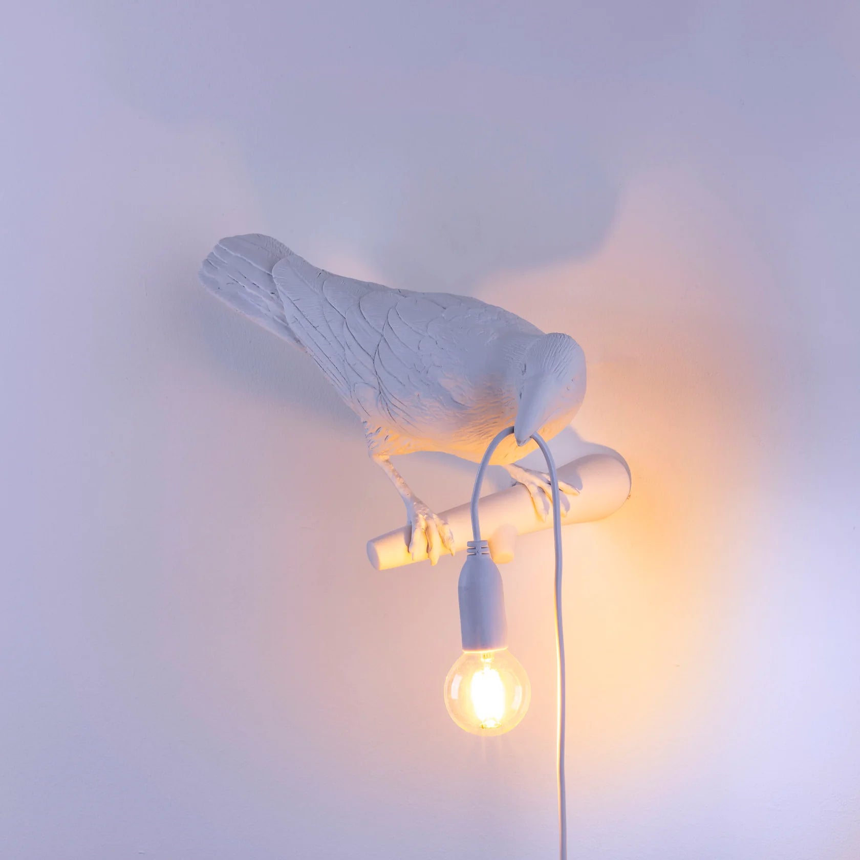 Lámpara decorativa de pájaro blanco orientado a la derecha para interior y exterior